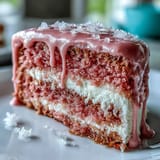 Stunning Bridal Shower Rosé Velvet Cake, showcasing a luscious pink hue and gleaming gold frosting.