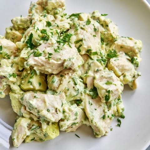 Warm chunks of seasoned chicken breast tossed in creamy avocado ranch dressing with crunchy celery and red onion.